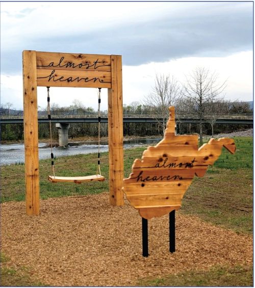 SWING BY FOR A VISIT - Petersburg is now of the more than 60 West Virginia locations to boast an iconic wooden swing, located near the city bridge at the water access point.